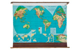 Vintage 60s Weber Costello world pull-down map, vibrant blue oceans and green landmasses.