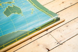 Vintage chalkboard map bottom with wooden dowel, brittle edge, and Australia.