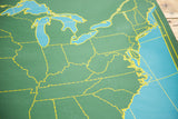 Vintage USA chalkboard map detail, green states, yellow borders, blue water, faint chalk.