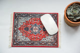 1930's Heriz Mouse Pad with ornate cherry red medallion, navy blue, and ivory patterns.