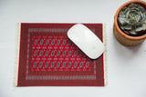 Turkmen Bokhara Mouse Pad with saturated red field, elephant footprint guls, 7x9 inches.