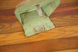 Mint green Art Deco mirror base, original 'Hollywood' foil sticker, worn paint.