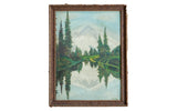 Vintage landscape painting featuring evergreen trees, mirrored water, distant mountain, ornate frame.