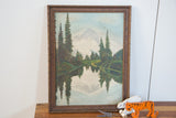 Vintage landscape painting featuring mirrored lake reflection and S Meyers signature.