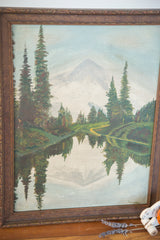 Vintage landscape painting's bottom right, showing S Meyers signature and mirrored water.