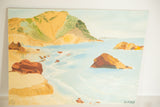 Artist Ian McNitt's signature on the bottom right of the mid century seascape painting.