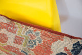 Antique Mahal rug pillow's intricate reverse weave texture in rust, blue, and cream.
