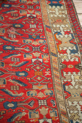 Vintage Malayer runner: cherry red geometric herati field, mending, and ivory crab border.