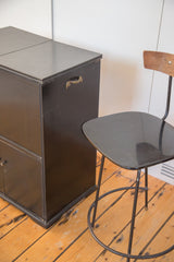 Antique hidden bar bureau's lower cabinet doors and original Victorian-style hardware.