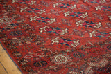 Antique Tekke Bokhara rug detail: alternating gul motifs in madder red, navy, and mallard green.