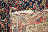 Antique Malayer runner's foundation weave, cream fringe, and detailed rewoven patch.