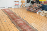 Distressed antique Hamadan runner, brick red herati motif, long and narrow, early 20th century.