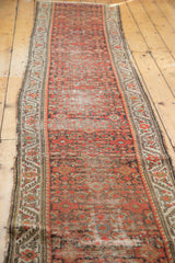 Artfully distressed antique Hamadan runner featuring brick red herati pattern and bark tones.