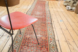 Distressed antique Persian Hamadan runner with brick red Herati motif and meandering borders.