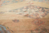 Distressed pile of an antique Halvai Bijar, showcasing camel field, aqua blue, and blush motifs.