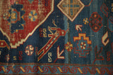 Striated indigo field, geometric animal figures, and detailed border of antique Seichor Kuba rug.