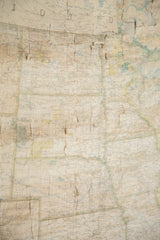 Aged paper texture and prominent creases on the vintage USA map.