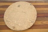 Newspaper backing on the reverse of the vintage 1940s gold painted mirror.