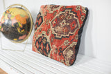 Antique Amu Darya tribal rug pillow, featuring rich red, black, and aubergine geometric pattern.