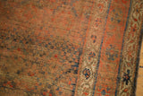Textural worn pile and muted geometric pattern detail on this antique Kurdish rug.