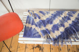 Hand-woven vintage African textile throw, indigo tie-dye pattern and long tassels.