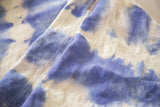Supple hand-woven African textile, featuring organic indigo blue and ivory resist-dye pattern.