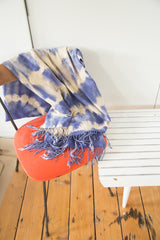 Hand dyed blue and ivory vintage African textile throw with long, varied tassels.