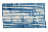 Vintage African indigo textile throw with hand woven ivory and denim blue striped design.