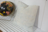 Faded powder blue vintage African Indigo throw pillow with subtle horizontal stripes, 20x20.