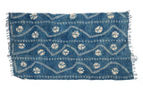 Hand-woven collectible African indigo throw with ivory circular and zigzag patterns, short fringe.