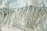 Hand-woven vintage African textile in powder and light blue with long pale blue tassels.
