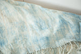 Hand-woven vintage African textile with variegated indigo and ivory color, short tassels.