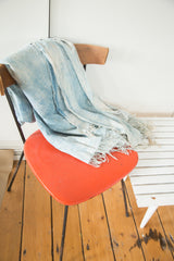 Hand-woven vintage African indigo throw, subtle blue cotton texture and short tassels.