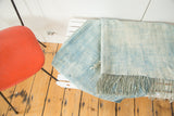 Vintage African textile, hand-woven with varying powder blue dye and fringe detail.
