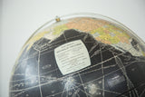 Rand McNally legend and label on a vintage 1960s black world globe.