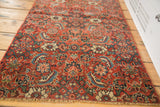 Intricate hand knotted Bijar pattern featuring bold red, blue, and ivory motifs, with fringe.
