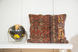 Antique Bijar Floor Pillow, a rich red Persian fragment with dusty yellow and ivory border motifs.