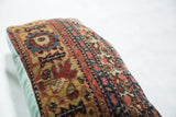 Antique Bijar rug border, intricate ivory, red, gold pattern, with faded turquoise linen.