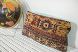Antique Bijar rug border pillow, intricate ivory, yellow, red floral pattern, faded turquoise back.