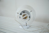 Vintage white spotlight desk lamp with coiled bulb and translucent acrylic cap.