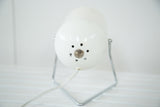 Mid Century white spotlight lamp rear, paint chipping detail, central screw, and cord.