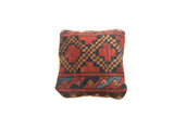 Unique antique Afghani pillow, handmade with rust, gold, and blue geometric diamond motifs.