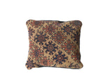 Antique Turkmen rug fragment pillow, geometric pattern in khaki, deep brown, dark blue.