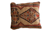 Lower corner of the plush camel hair Serab floor pillow with navy backing.