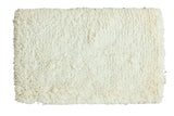 Creamy ivory hand-woven Moroccan shag bath rug with a plush texture, 2' x 3'2