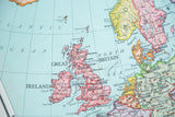 Vibrant vintage Nystrom map detail showing Great Britain and Northern Europe.