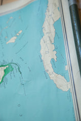 Vintage map detail showing Cuba and Florida in light blue and beige tones.