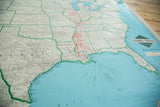 Illinois Central banner and red railroad lines on vintage map of Gulf Coast.