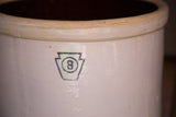 Antique crock detail showing blue-green keystone 