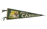 Vintage green felt South Carolina pennant, cream text, man playing guitar, 8x25 inches.